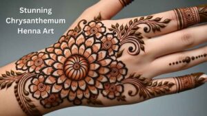 A beautiful, intricate chrysanthemum mehndi design on the back of a hand, showcasing modern floral henna art.